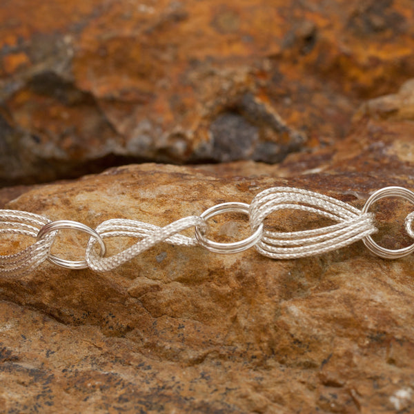 Woven Infinity Sterling Silver and Rhodium Bracelet