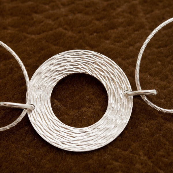 Woven Wreath Sterling Silver and Rhodium Plated Multi-ring Toggle Necklace