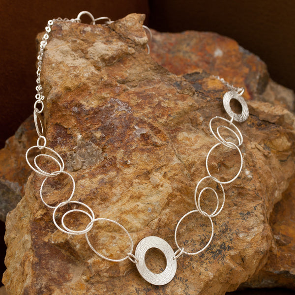 Woven Wreath Sterling Silver and Rhodium Plated Multi-ring Toggle Necklace